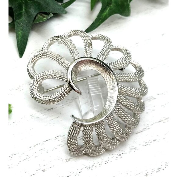 Vintage Monet Silver-Tone Textured Brooch With Open Scrollwork Design - Picture 1 of 4